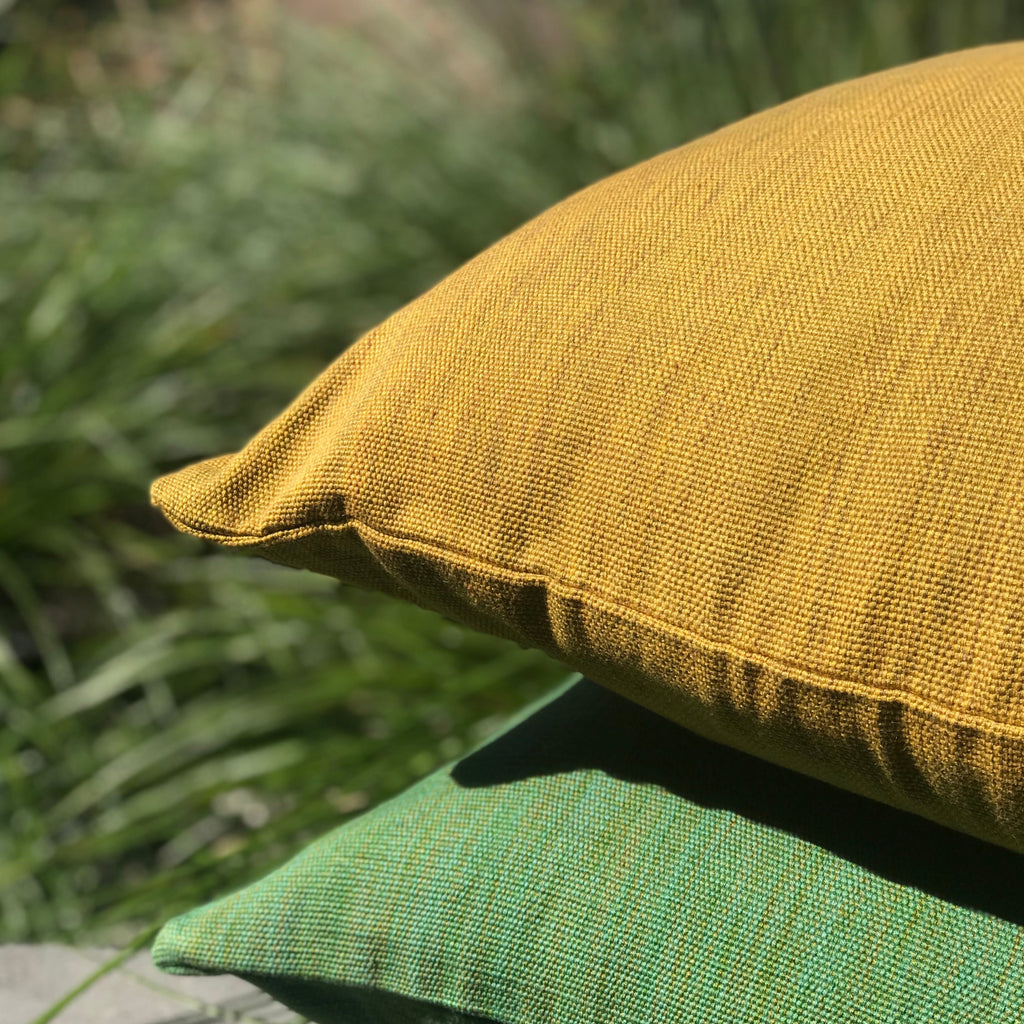 Mustard organic dalitso cushion featuring sage green organic dalitso cushion. Handwoven in Guatelama. Designed by Woven.