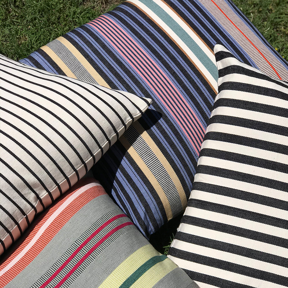 Jenna cushion. Black and white stripes made with 100% organic cotton and natural dyes. Featuring Filip and Sofia cushionsDesigned by Woven. Handmade in Guatemala.