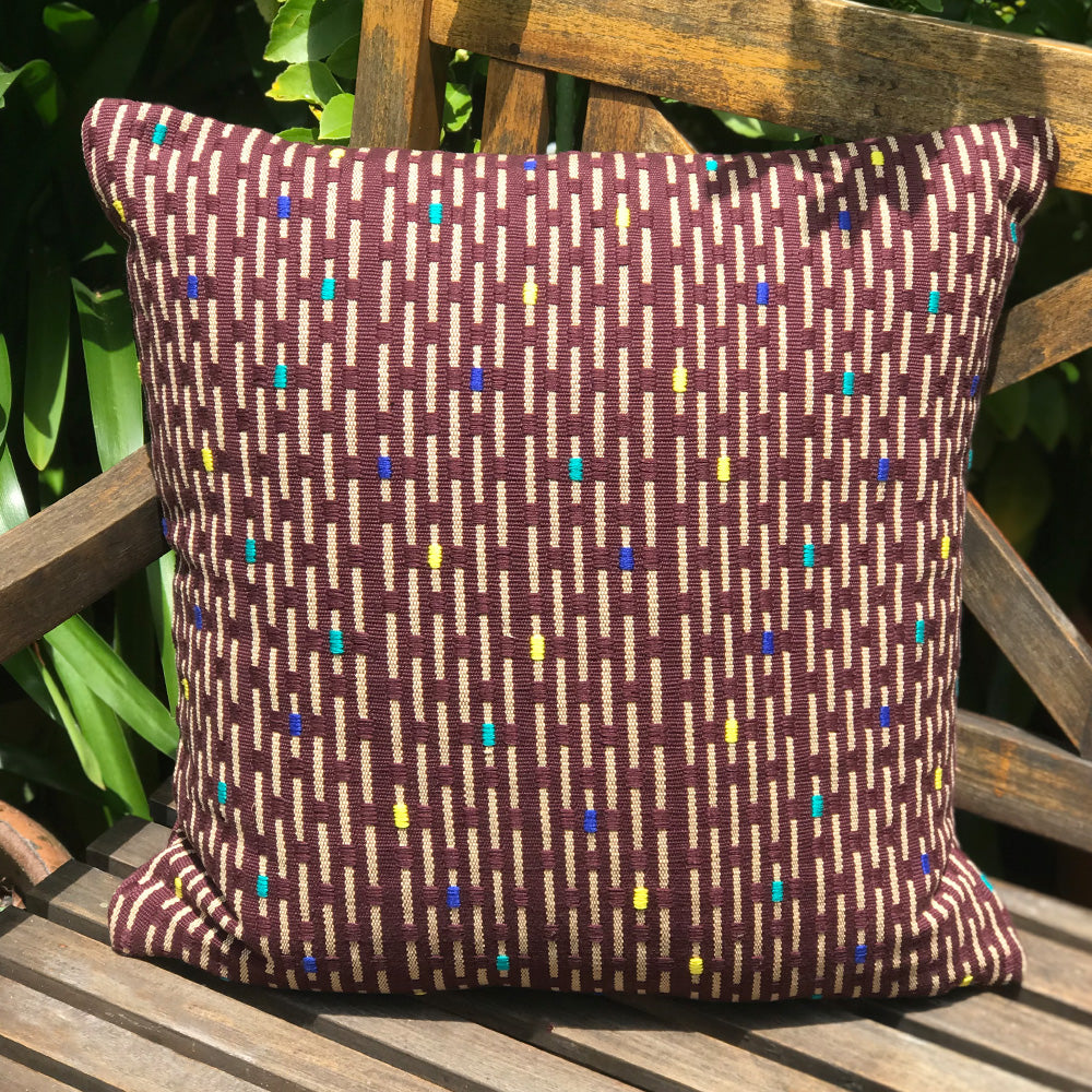 Kate cushion. Brown with yellow rain drop design made with 100% organic cotton and natural dyes. Designed by Woven. Handmade in Guatemala.