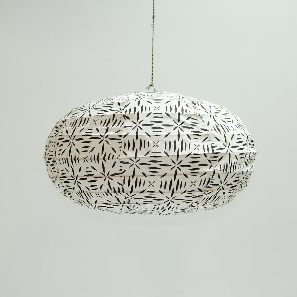 Small block printed black and white starry eye  cotton lampshade. Designed by Woven. Handmade in Bangladesh.