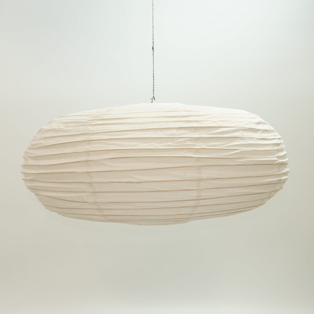 Extra large cotton lampshade in white. Designed by Woven. Handmade in Bangladesh.